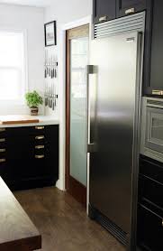 Tall kitchen cabinetry was the standard back then! It S Done The Full Kitchen Reveal Chris Loves Julia