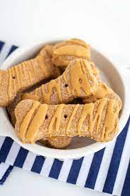 How fun is it to give our beloved dogs an extra special treat? Homemade Peanut Butter Dog Treats Cookie Dough And Oven Mitt