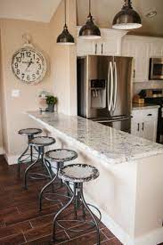 White Granite The Dining Room Breakfast Bar Vacation Home Remodel The Tomkat Kitchenremode Kitchen Design Kitchen Remodel Modern Kitchen Lighting
