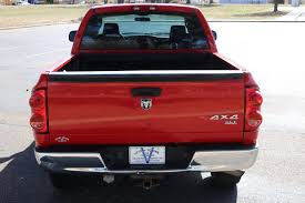 Image result for Deep Coral Red 2007 Dodge Truck