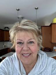 Should I get wispy bangs or no bangs with a short haircut?