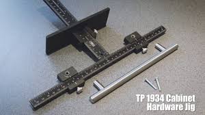 A hardware jig for your cabinets allows you to install the necessary hardware (knobs, handles, etc.) for your cabinet quickly and accurately. How To Install Cabinet Hardware Cabinet Door Handles With The Tp 1934 Youtube