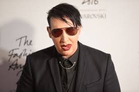 Brian hugh warner (born january 5, 1969), known by his stage name, marilyn manson, is an american singer, songwriter, musician, composer, actor, painter, author, and former music journalist. Marilyn Manson Bio Wife Net Worth Age Girlfriend Dad Gay Is He Dead Networth Height Salary