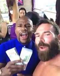 Conor McGregor takes shot at UFC rivals as double champion shows off his  wads of cash