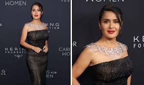 Salma Hayek Proves the Art Decos in the Details in Pinstriped Gucci Dress  and Statement Necklace at Kerings Caring for Women Dinner 2024