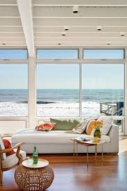The geometric lines of the furniture and accessories help to reinforce the clean and crisp look. Link Roundup How To Decorate A Beach House Interior Design Ideas