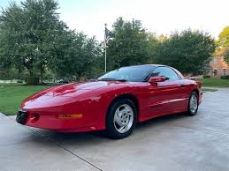 Image result for Nightfire Red 1994 Reliant