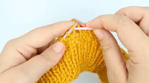 To make (a garment, fabric, etc.) by interlocking loops of one or more yarns either by hand with knitting needles or by machine. How To Knit Cables For Beginners Knitting With Chopsticks