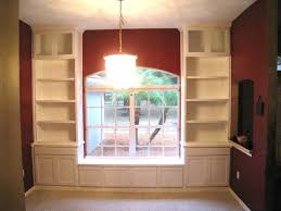 With that in mind, if you want to create your own special reading zone, why not make a window seat that incorporates a bookshelf? Hand Crafted Custom Built In Bookcases Window Seat By Natural Mystic Woodwork Custommade Com