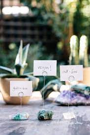 Design the perfect wedding place cards to match your wedding suite. Diy Crystal Place Card Or Food Label Holders Place Card Holders Wedding Diy Crystals Wedding Card Holder