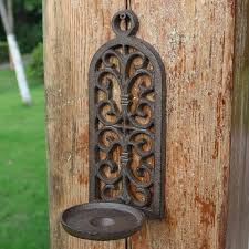 Handcrafted of strong materials, they are made to compliment your home's decor and appearance for years to come. Candle Holders Cast Iron Vintage Brown Wall Mount Candle Holder Candlestick Home Wedding Hanging Metal Decoration Tealight Holder From Olddecor 68 35 Dhgate Com