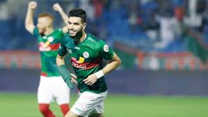 وهو أحد أشهر الأندية السعودية. Ø§Ù„Ø§ØªÙØ§Ù‚ Ø§Ù„Ø³Ø¹ÙˆØ¯ÙŠ ÙŠÙˆØ§Ø¬Ù‡ Ù…Ø·Ø§Ù„Ø¨ Ø£Ø²Ø§Ø±Ùˆ ÙˆØ§Ù„Ø£Ù‡Ù„ÙŠ Ø§Ù„Ù…ØµØ±ÙŠ Ù…Ù† Ø£Ø¬Ù„ ØªÙ…Ø¯ÙŠØ¯ Ø§Ù„Ø¥Ø¹Ø§Ø±Ø© Ø§Ù„ØªÙŠØ§Ø± Ø§Ù„Ø§Ø®Ø¶Ø±