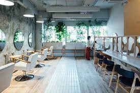 Fathom Finishes Miyanishi Yakeyama Hair Salon In Japan With Wall Of Greenery Copper Pipes Hair Salon Interior Biophilic Design Wellness Studio Design