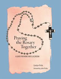 Begin by holding the crucifix, saying in the name of the father and of the son and of the holy spirit, (making the sign of the cross while doing that), then say the apostles creed. Gia Publications Praying The Rosary Together