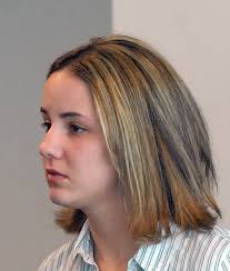 Framingham mother denies assault charges