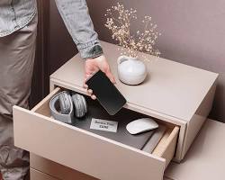 Image of person putting smartphone in a drawer and relaxing peacefully without technology digital detox photo reference