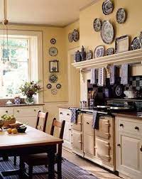 Bright yellow kitchens with painted kitchen cabinets. Interior Styles Designs Cottage Kitchen Design Small Cottage Kitchen Cottage Kitchens