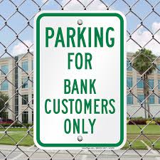 They have discountinued $10,000 bills. Parking For Bank Customers Only Sign