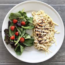 Angel hair alfredo salmon pasta. Healthy Chicken Alfredo For Dinner Tonight Chickpea Angel Hair Pasta With Grilled Chicken Homemade Alfredo Sauce Made From Greek Yogurt Fooducate Diet Motivation