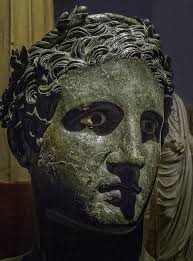 Bronze Head Of Ptolemy Ii Philadelphus Ruler Of Egypt In The Guise Of A Greek God Found In The Villa Dei Papyri In Herculaneum Roman 50 Bce 25 Bce Greek Gods Herculaneum Bronze