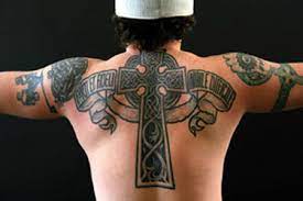 Back body winged celtic cross tattoo. 07 December 2009 Cross Tattoos Pictures