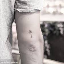 Tiny Palm Tree Tattoo On The Back Of The Right Arm Tree Tattoo Men Tree Tattoo Back Palm Tree Tattoo
