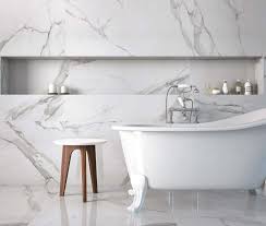 Instead, use tile in more interesting ways from artistic creations to bamboo materials, there are plenty of functional and stylish ideas that can and will work. Place White Marble Effect Wall Tiles Tiles From Tile Mountain