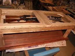 Doors have glass and table is made out of wood. Gun Showcase Coffee Table By Vpbarnwood Lumberjocks Com Woodworking Community