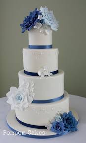 Ivory Wedding Cake With Blue Roses Ivory Wedding Cake Wedding Cakes Blue Gorgeous Wedding Cake