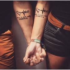 40 Unique And Matching Couple Tattoo Designs Outfitcafe Couples Tattoo Designs Matching Couple Tattoos Couple Tattoos Unique