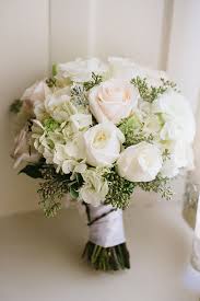 A lush white wedding bouquet with peonies, roses and some foliage is an elegant idea. Elegant Handmade Gold Wedding Glamour Grace Elegant Wedding Flowers Elegant Wedding Bouquets Elegant Bouquet