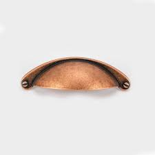 In the early 20th century, stamped brass bin pulls such as this were common in more modest homes throughout america. Copper Finish Shaker Style 64mm Hole Centres Kitchen Cupboard Cup Handles Cup Handles Shaker Style Kitchen Cupboards