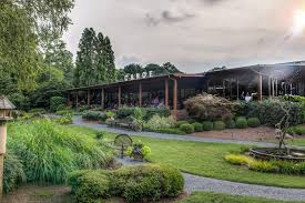 Tropical flowers such as dahlia bulbs color up the patio splendidly. 28 Metro Atlanta Patios Ready For Winter Dining Atlanta Magazine