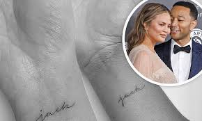 The cravings author posted a photo on twitter showing off a new tattoo on her wrist that shows his name. John Legend Gets Matching Jack Tattoo With Wife Chrissy Teigen In Honor Of The Son They Lost Daily Mail Online