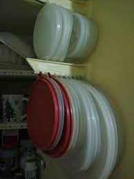 If you've been working on your green resolutions this year, choosing safer food storage containers should be on your list. This 70s Tupperware Patent Lid Holder At My Grandma S House Specializedtools