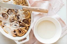 Easy recipe for the best cream cheese icing for cinnamon rolls made with staple ingredints. Best Cinnamon Roll Icing Julie Blanner