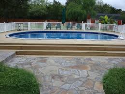 Secure your swimming pool now! Oval Above Ground Pool With Deck Traditional Swimming Pool Hot Tub Austin By The Above Ground Pool Spa Company Houzz Uk