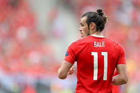 Gareth bale posed with a flag that read wales. Wales 2 Slovakia 1 Gareth Bale S Performance In Focus As Coleman S Men Win Euro 2016 Opener North Wales Live