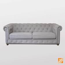 Deep diamond tufting along the backrest complements the smoothly sloped arms that are cut back for added leg room. Home Decorators Collection Gordon Natural Linen Sofa 0849400400 The Home Depot Home Living Room Home Decor Home
