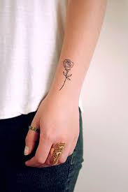 Rose Arm Rings Jeans White Top Small Tattoo Ideas For Women White Background Hand Tattoos For Women Hand Tattoos Elephant Tattoo Small