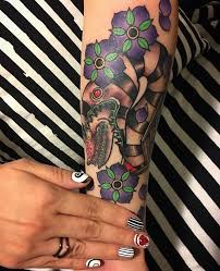 What Is Black And White And Red All Over Answers Burtonesque Marquesan Tattoos Beetlejuice Tattoo Tattoos