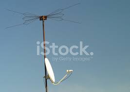 1 large (76cm) dish with a biquad antenna. Satellite Dish And Old Tv Antenna Stock Photos Freeimages Com