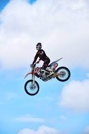 White dirt bike, motocross, motorcycle, sports, helmet, sports helmet. Dirt Bike Wallpapers Free Hd Download 500 Hq Unsplash