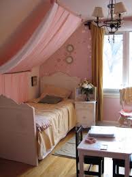 Decorating ideas for designing a beautiful bedroom with sloped ceilings. I Love This Idea Since My Girls Share A Bedroom W Slanted Ceilings Sloped Ceiling Bedroom Bedroom For Girls Kids Slanted Ceiling Bedroom
