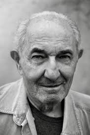 Wallace Mobley owner of Seminole Pharmacy which was at corner of Taylor and  Marion admiring huge Goliath grouper about 100 years ago circa 1920.