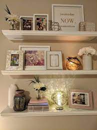 An elegant living room can also benefit from a floating shelf. Romantic Glam Floating Shelves In Master Bedroom Shelf Decor Living Room Floating Shelf Decor Floating Shelves