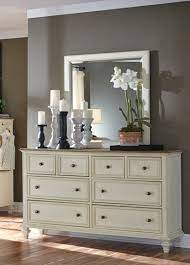 Decorating With Mirrors Dark Greige Wall With Warm White Dresser And Mirror Love The Way They Grouped The Candle Holders Mirror Decor Greige Walls Decor
