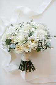 This soft, elegant rose is completely different than other contemporary cut roses. Jordan Denike Photography L Bridal Bouquet L White Wedding Bouquet Flower Bouquet Wedding White Rose Bridal Bouquet White Roses Wedding