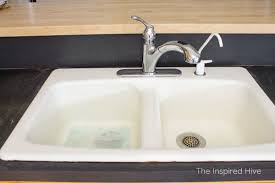 How To Clean An Enameled Cast Iron Kitchen Sink Sink Cast Iron Kitchen Sinks Kitchen Sink