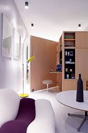 Un Cube En Bois Central Multi Facettes Marie Claire Maison Amenagement Petit Espace Petit Espace Cube En Bois